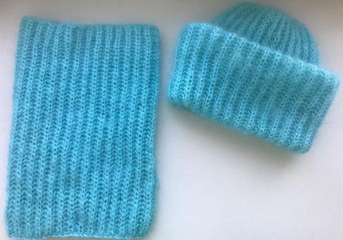 Gestrickte Damenmützen. Wie man eine Beanie strickt, mit Umschlag, voluminös, Winter, mit Arans, Querzopf. Schemata mit Modellbeschreibung