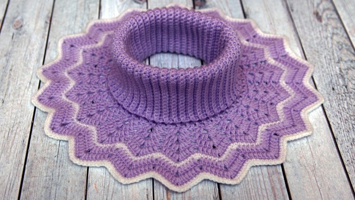 Gestricktes Lätzchen für ein Mädchen. Muster und Beschreibung für Anfänger, Kinder auf Knöpfen