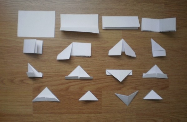 Modulares Origami für Anfänger aus Papier. Schritt-für-Schritt-Anleitung, Diagramme: Schwan, Vase, Blumen, Pfau, Drache, Storch