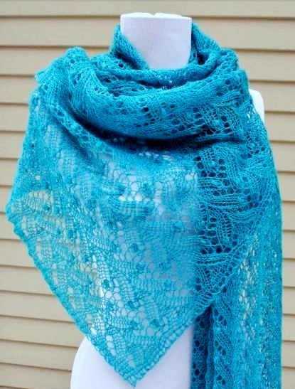 Mit Nadeln gestrickte durchbrochene Schals. Schemata und Beschreibung für Anfänger