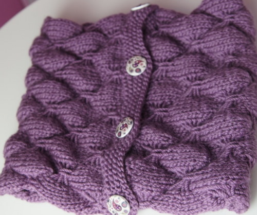 So stricken Sie einen Kinder-Snood mit Stricknadeln. Anleitung mit Beschreibung für Anfänger