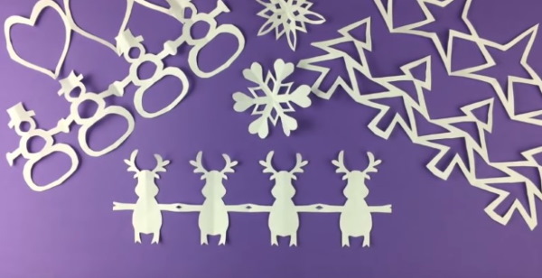 Neujahrsausschnitte. Vorlagen für Fenster: Mäuse, Bälle, Nu Pogodi, Eulen, Schneeflocken, Weihnachtsmann, Zeichentrickfiguren
