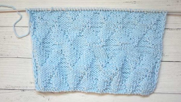 Einen Herrenschal mit Stricknadeln zu stricken ist schnell und einfach. Schemata mit Fotos, Mustern