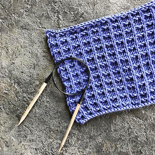 Gestrickter Snood für einen Jungen. Strickanleitungen mit Schritt-für-Schritt-Beschreibungen mit Fotos