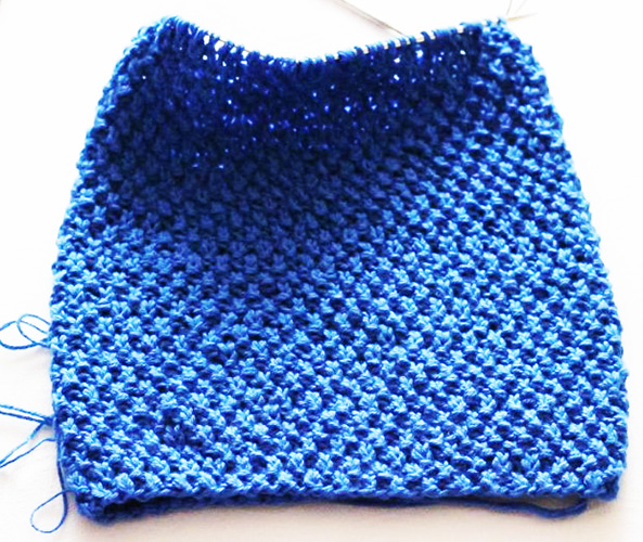 Gestrickter Snood für einen Jungen. Strickanleitungen mit Schritt-für-Schritt-Beschreibungen mit Fotos