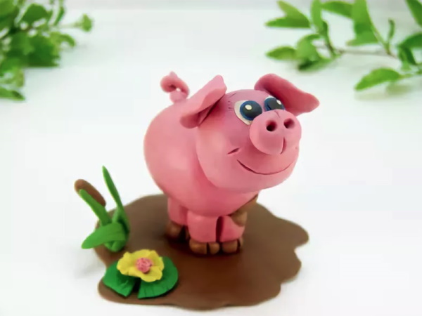 So basteln Sie mit Ihren eigenen Händen ein Plastilinschwein für Kinder. Foto