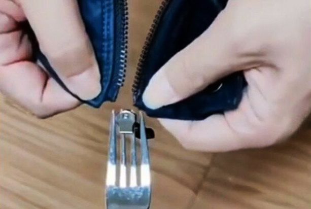 Wie man einen Reißverschlussschieber anbringt, installiert und befestigt