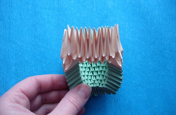Springender Papierfrosch. Origami-Diagramm Schritt für Schritt