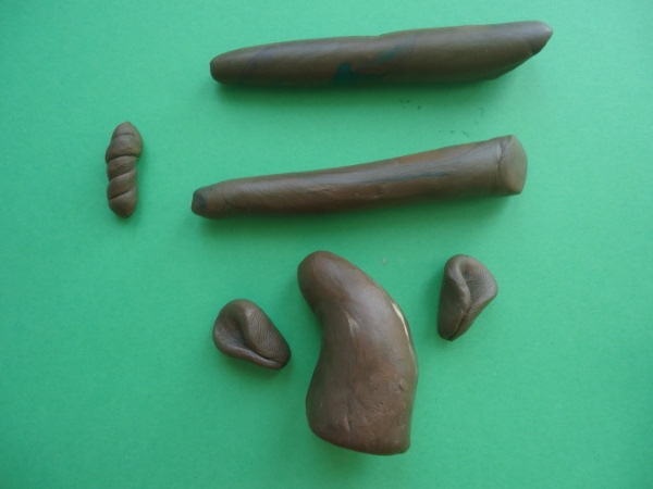 Dymkovo-Spielzeug aus Plastilin. Modellierung Schritt für Schritt