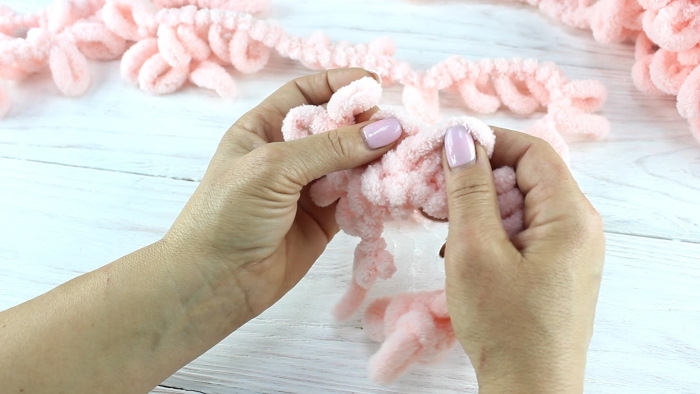Garn zum Handstricken ohne Stricknadeln. Namen, wie man strickt