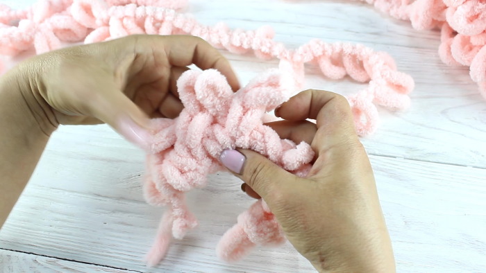 Garn zum Handstricken ohne Stricknadeln. Namen, wie man strickt