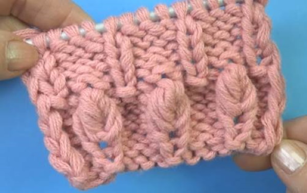 Ährchenmuster-Stricknadeln. Schema und Beschreibung der länglichen Schleifen, durchbrochen