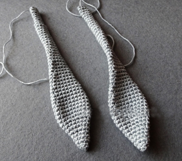 Hase mit langen Ohren gehäkelt. Wie man Amigurumi strickt, Muster, Beschreibung