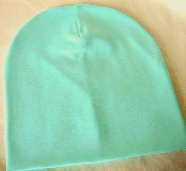 Strickmütze für Damen. Muster, wie man mit eigenen Händen näht