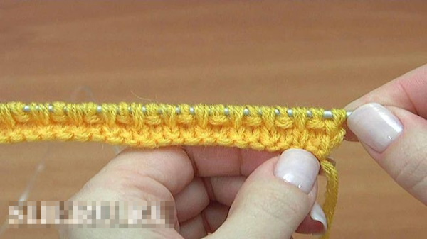 Fußabdrücke auf zwei Stricknadeln ohne Naht. Beschreibung und Diagramm