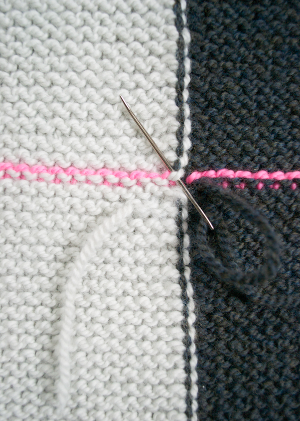 Rechteckige Weste mit Nadeln gestrickt. Schema und Beschreibung