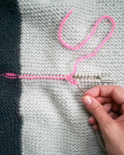 Rechteckige Weste mit Nadeln gestrickt. Schema und Beschreibung