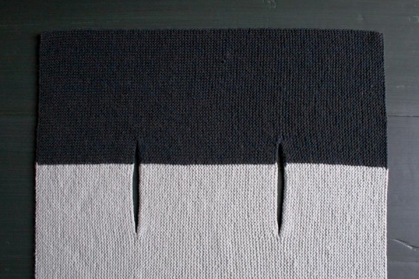 Rechteckige Weste mit Nadeln gestrickt. Schema und Beschreibung
