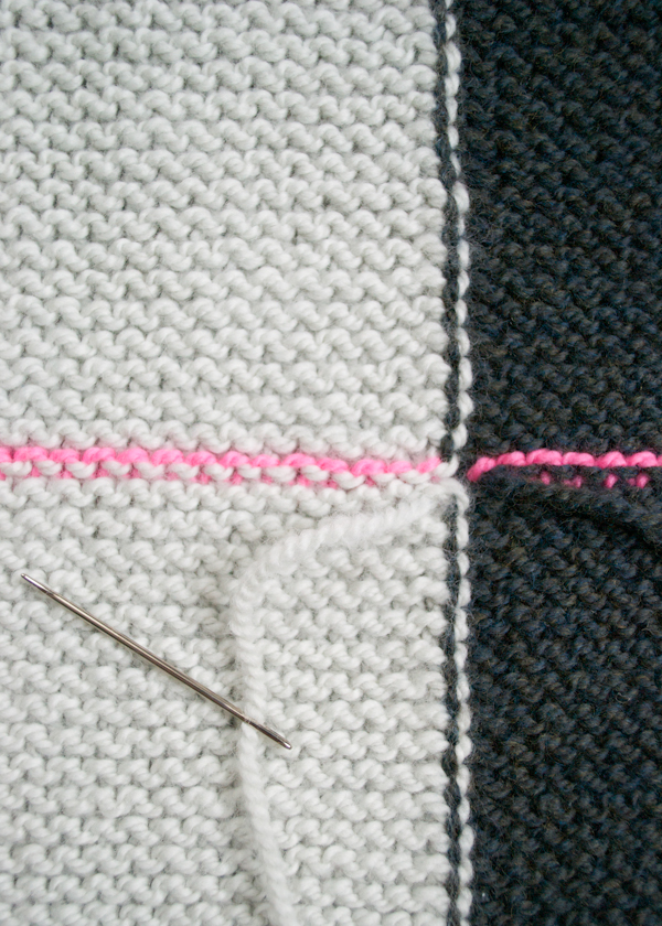 Rechteckige Weste mit Nadeln gestrickt. Schema und Beschreibung