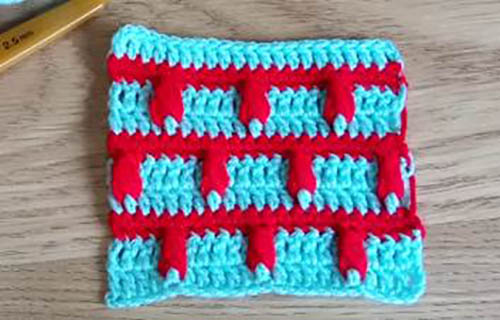 Zweifarbige Häkelmuster. Strickmuster und Beschreibungen