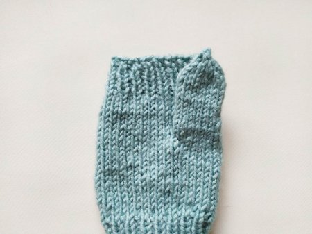 Umschlagfäustlinge. Wie man Männer, Kinder, Frauen Stricknadeln strickt, häkelt