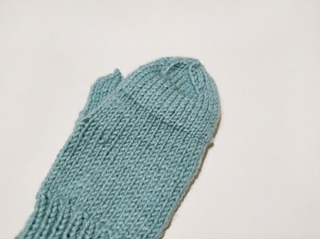 Umschlagfäustlinge. Wie man Männer, Kinder, Frauen Stricknadeln strickt, häkelt