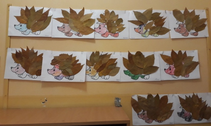 Applikation mit Herbstblättern. Igel