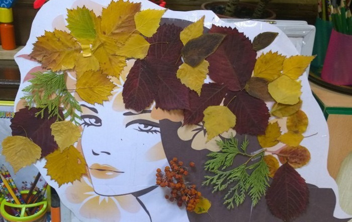 Applikation mit Herbstblättern. Porträt