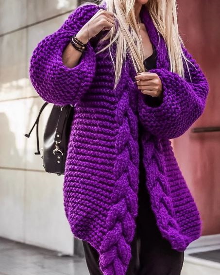 Übergroße Strickjacke gestrickt. Schema mit Beschreibung für Frauen