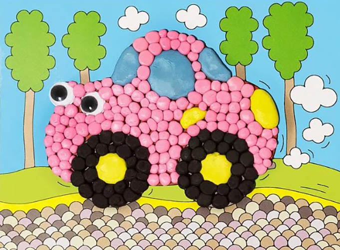 Plastilin-Applikation auf Karton für Kinder. Probe