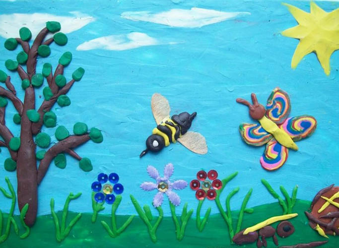 Plastilin-Applikation auf Karton für Kinder. Probe
